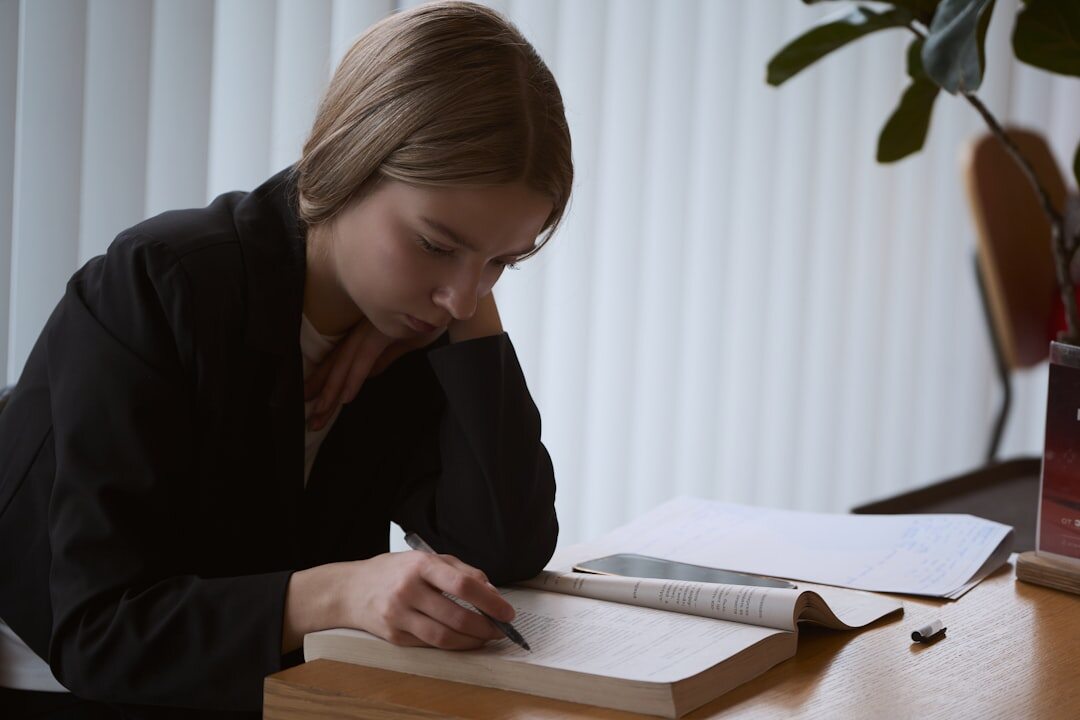 writer at desk with notebook