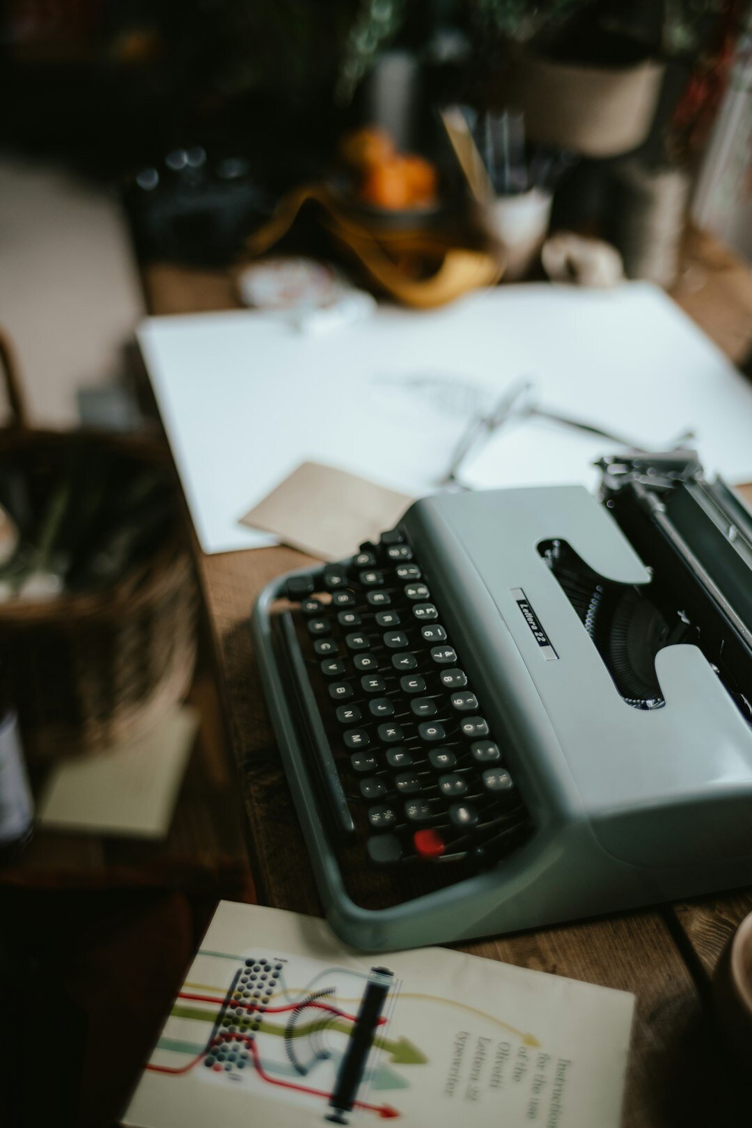 author typing on typewriter