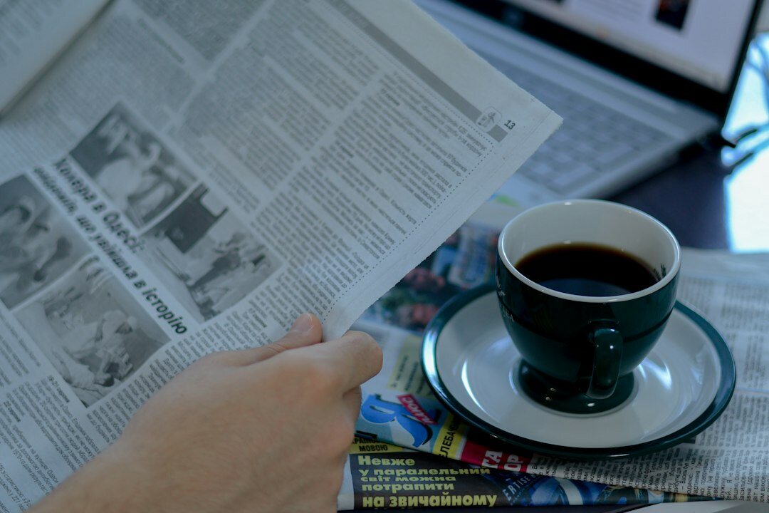 mystery writer researching old newspapers